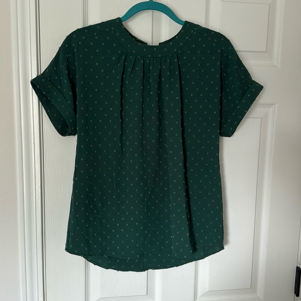 Green work top with button back closure